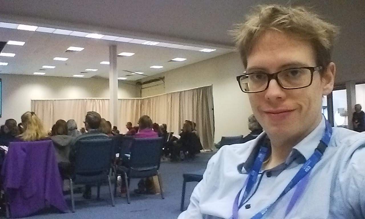 A picture of Jorik at a conference