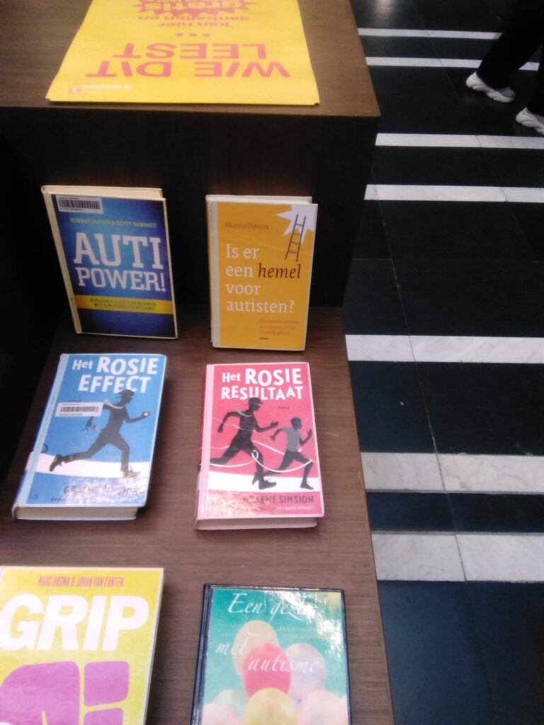 An image from the Central Library, Utrecht. These books are all about autism, including the future classic 'Do Autistics Go To Heaven?' Answer: no.